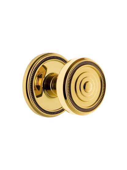 Grandeur Soleil Rosette Door Set with Soleil Knobs in Polished Brass.